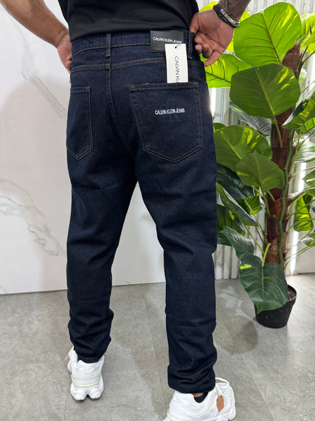 CALVIN KLEIN JEANS Embroidered Pocket Raw Slim Denim Jeans – Raw Dark Indigo - NEW1995